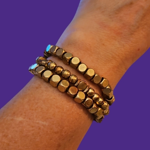 3/$30 Matte Goldtone Metal Stretch Bracelets - Picture 1 of 4